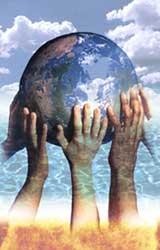 alt="globe supported by hands"